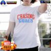 Hot Chasing Goals Ice T-Shirt featuring a bold graphic design, perfect for sports enthusiasts and casual wear.