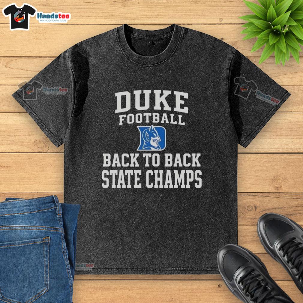 hot-duke-blue-devils-football-back-to-back-state-champs-washed-t-shirt Alt Text: Hot Duke Blue Devils football back-to-back state champs washed t-shirt showcasing team pride and vintage style.