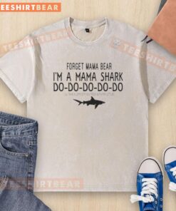 Alt Text: Mama Shark washed t-shirt featuring 'Mess with my littles, I'll take a limb off' design for mothers.