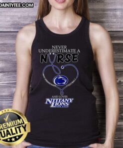 Female nurse wearing a heart tank top, showcasing her love for football and the Penn State Nittany Lions.
