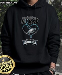 Alt Text: Hot hoodie featuring 'Never Underestimate a Nurse Who Loves Eagles' design, perfect for Philadelphia Eagles fans.