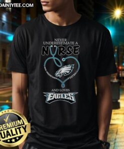 Alt Text: Hot Never Underestimate A Nurse Who Understands Football and Loves Philadelphia Eagles Heart T-Shirt design