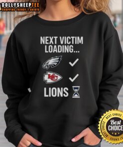 Hot Next Victim Loading Lions Hourglass Sweatshirt featuring a unique graphic design and comfortable fit for casual wear.