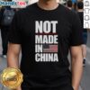 Hot Not Made In China T-Shirt featuring bold graphics and a stylish design for a trendy, ethical fashion statement.