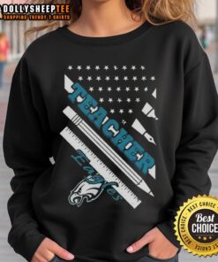 Alt Text: Cozy hot Philadelphia Eagles football sweatshirt featuring an American flag design, perfect for fans and teachers.