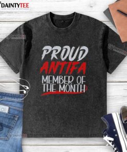 Alt Text: Hot Proud Antifa Member of the Month wearing a washed t-shirt, showcasing activism and style in a vibrant urban setting.