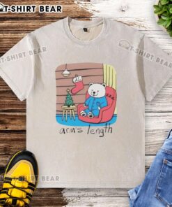 Hot and sleepy polar bear relaxing on a washed t-shirt, showcasing a playful design perfect for casual wear.