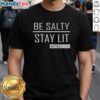 Hot Trump Girl Be Salty Stay Lit T-Shirt featuring a vibrant design with bold text and a playful graphic.