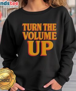 Alt Text: Stylish Hot Turn The Volume Up sweatshirt by Zohran Mamdani, featuring bold graphics and a trendy design.