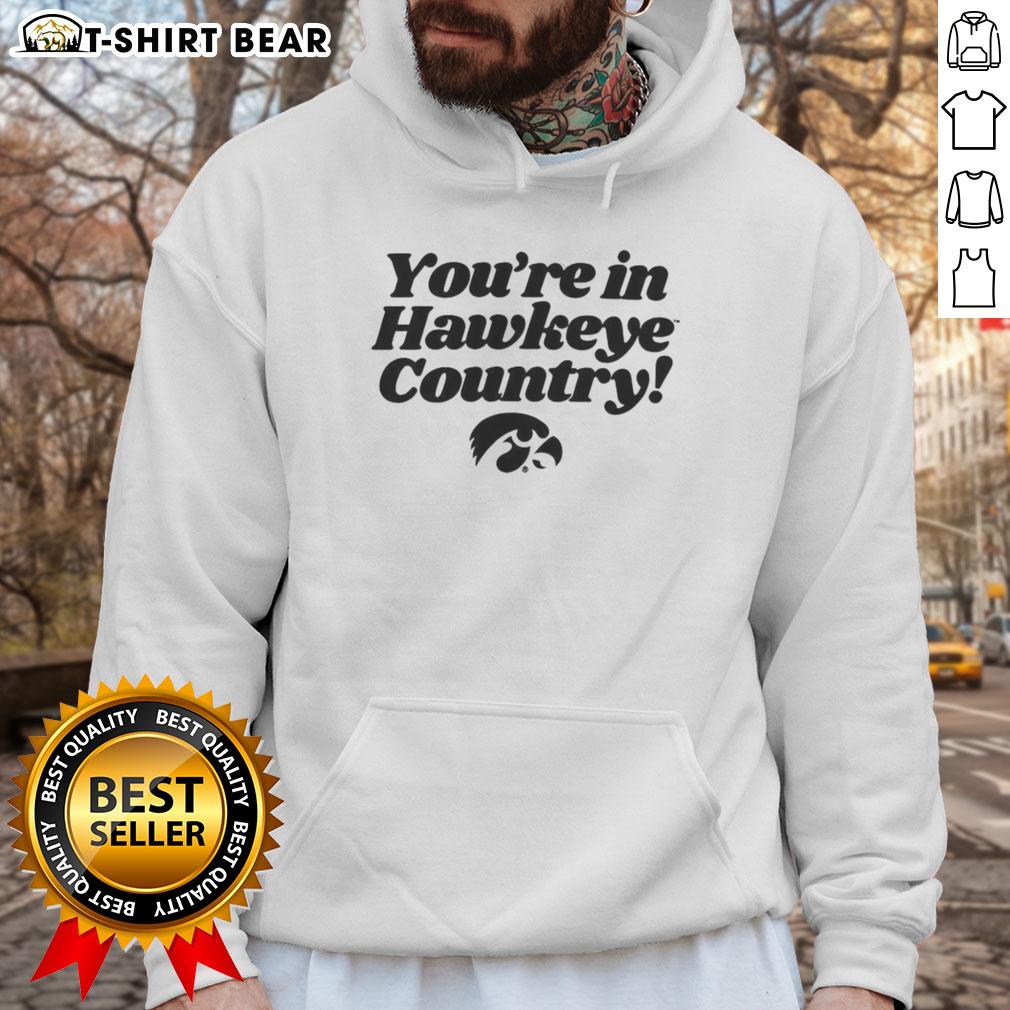 Hot You'Re In Hawkeye Country Hoodie Cozy 'Hot You're in Hawkeye Country' hoodie displayed on a mannequin against a rustic backdrop, perfect for fans.