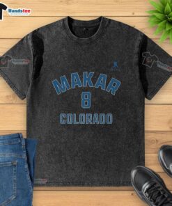 Alt Text: Cale Makar Colorado Avalanche Ice Hockey Name and Number 8 washed t-shirt displayed in a casual setting.