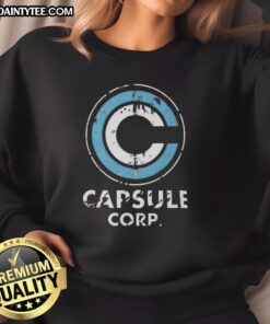 Alt Text: Distressed Capsule Corp. logo on a stylish Dragon Ball Z sweatshirt, perfect for anime fans and casual wear.