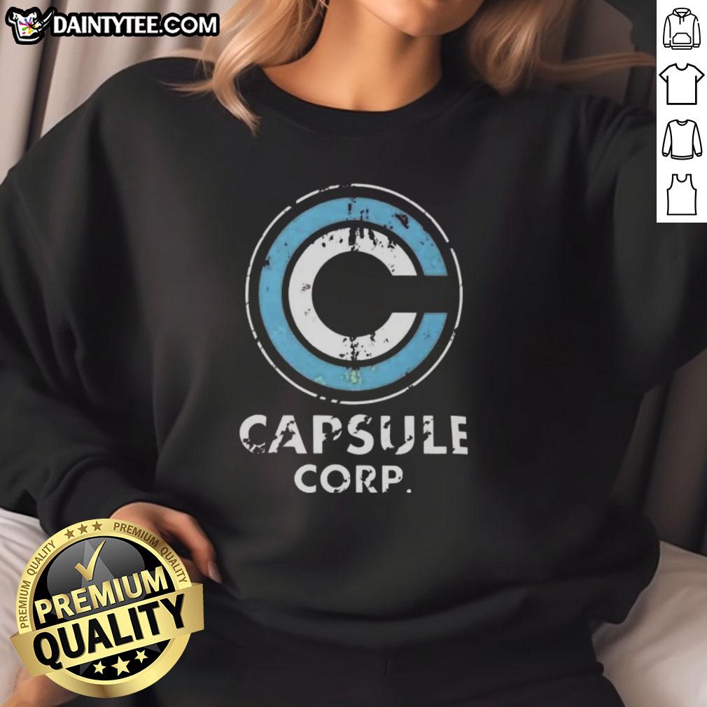 nice-capsule-corp-distressed-logo-dragon-ball-z-sweatshirt Alt Text: Distressed Capsule Corp. logo on a stylish Dragon Ball Z sweatshirt, perfect for anime fans and casual wear.