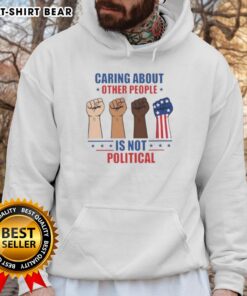 Nice Caring About Other People Is Not Political Fists Hoodie showcasing a vibrant design promoting kindness and unity.
