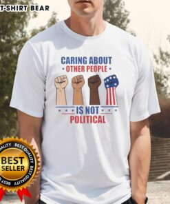 Alt Text: Nice Caring About Other People Is Not Political Fists T-Shirt featuring a bold graphic design promoting kindness.