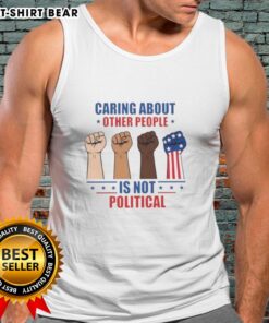 Nice caring about other people is not political fists tank top featuring a bold, colorful design promoting compassion.