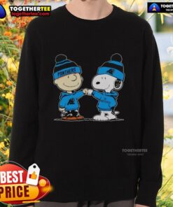 Alt Text: Cozy sweatshirt featuring Snoopy and Charlie Brown, perfect for Carolina Panthers fans and best friends.