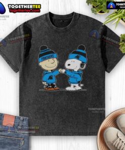 Nice Carolina Panthers Snoopy and Charlie Brown Best Friends washed t-shirt featuring iconic comic characters in team colors.
