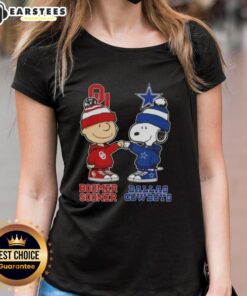 Nice Charlie Brown fist bump with Snoopy on a Bommer Sooner X Dallas Cowboys ladies tee, perfect for fans.