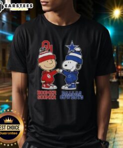 Charlie Brown fist bump with Snoopy on a Bommer Sooner X Dallas Cowboys T-shirt, perfect for fans and collectors.