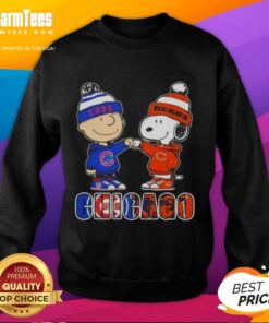 Nice Charlie Brown fist bump with Snoopy on a Chicago Cubs and Bears sweatshirt, showcasing city sports spirit.