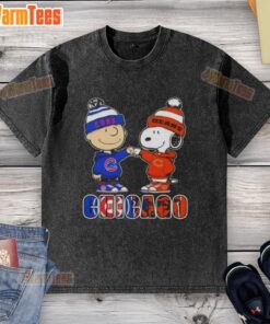 Charlie Brown and Snoopy fist bump on a Chicago sports T-shirt featuring Cubs and Bears themes, showcasing team spirit.