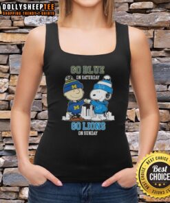 Alt Text: Charlie Brown fist bumping with Snoopy in a Detroit Lions Skyline tank top, cheering 'Go Blue!' for game day.