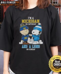 Alt Text: Cute Charlie Brown and Snoopy fist bump on a Michigan skyline ladies tee for Detroit Lions fans on Sundays.