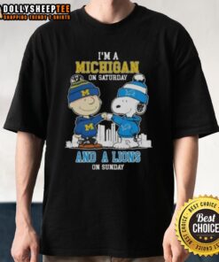 Charlie Brown and Snoopy fist bump on a Michigan and Detroit Lions skyline t-shirt, perfect for fans on game day.