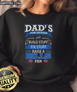 Alt Text: Cozy sweatshirt featuring 'Nice Dad's Job Duties: Build, Fix & Raise a Buffalo Bills Fan' design for football lovers.
