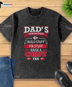 Alt Text: Kansas City Chiefs fan wearing a washed t-shirt, showcasing dad duties like building and fixing stuff.