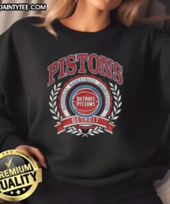 Alt Text: Retro sweatshirt featuring the Detroit Pistons NBA logo framed by a laurel wreath, perfect for basketball fans.