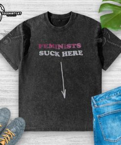 Nice Feminists Suck Here washed t-shirt in casual style, featuring bold text design for feminist advocacy.