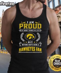 Iowa Hawkeyes fan wearing a tank top with the phrase 'I am proud of many things, but nothing beats being a Hawkeyes fan.'