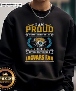Jacksonville Jaguars fan sweatshirt with 'Proud of Many Things' slogan, perfect for dedicated sports enthusiasts.