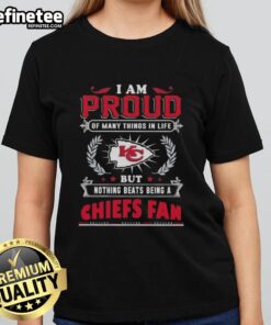 Stylish ladies tee featuring 'Proud to be a Kansas City Chiefs fan' design, perfect for game day and fan gatherings.