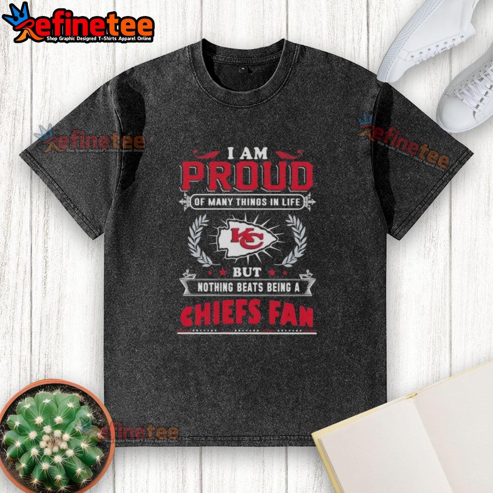 nice-i-am-proud-of-many-things-in-life-but-nothing-beats-being-a-kansas-city-chiefs-fan-washed-t-shirt Proud Kansas City Chiefs fan wearing a washed t-shirt celebrating their love for the team and football culture.