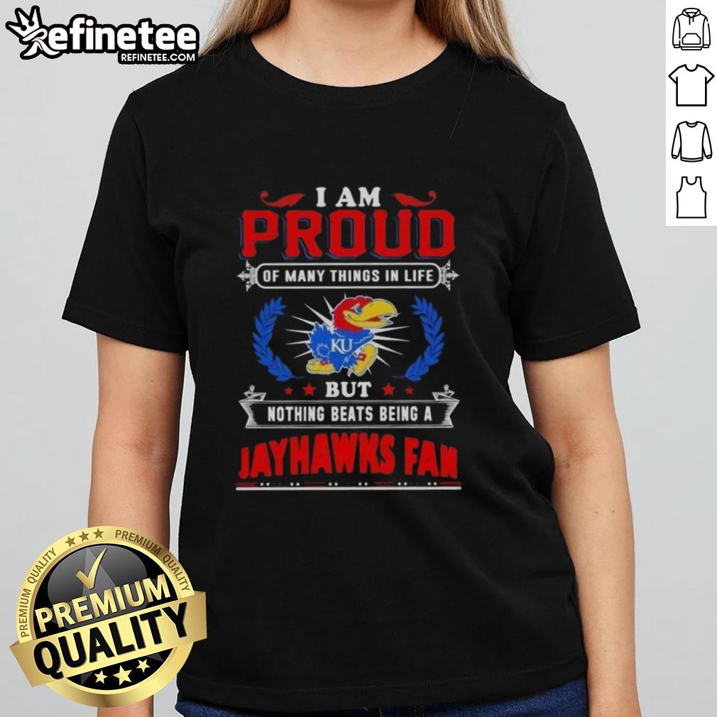 nice-i-am-proud-of-many-things-in-life-but-nothing-beats-being-a-kansas-jayhawks-fan-ladies-tee Womens tee featuring 'Proud Kansas Jayhawks Fan' design, perfect for showing school spirit and support for KU basketball.