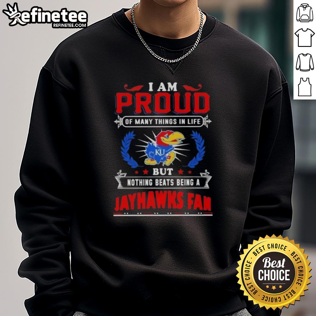 nice-i-am-proud-of-many-things-in-life-but-nothing-beats-being-a-kansas-jayhawks-fan-sweatshirt Cozy sweatshirt with 'Proud Kansas Jayhawks Fan' graphic, perfect for showing team spirit and support for KU basketball.