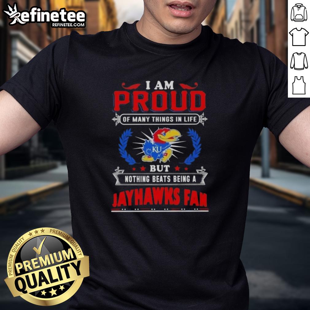 nice-i-am-proud-of-many-things-in-life-but-nothing-beats-being-a-kansas-jayhawks-fan-t-shirt Nice I Am Proud Of Many Things In Life But Nothing Beats Being A Kansas Jayhawks Fan T-Shirt design featuring team colors.