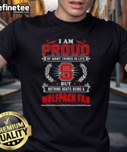 Alt Text: NC State Wolfpack fan T-shirt with 'I Am Proud Of Many Things In Life But Nothing Beats Being A NC State Wolfpack Fan' design.