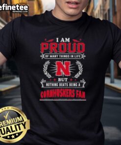 Alt Text: Nebraska Cornhuskers fan t-shirt with the phrase 'I Am Proud Of Many Things In Life But Nothing Beats Being A Nebraska Cornhuskers Fan'