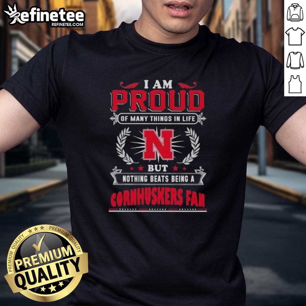 nice-i-am-proud-of-many-things-in-life-but-nothing-beats-being-a-nebraska-cornhuskers-fan-t-shirt Alt Text: Nebraska Cornhuskers fan t-shirt with the phrase 'I Am Proud Of Many Things In Life But Nothing Beats Being A Nebraska Cornhuskers Fan'