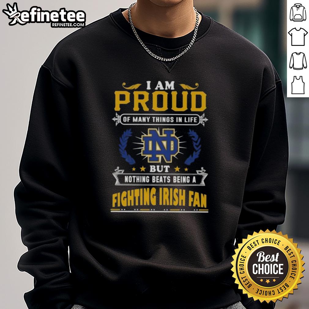 nice-i-am-proud-of-many-things-in-life-but-nothing-beats-being-a-notre-dame-fighting-irish-fan-sweatshirt Alt Text: Notre Dame Fighting Irish fan sweatshirt expressing pride in being a fan of the team, featuring vibrant colors and logo.