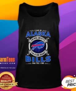 Alaska fan proudly wearing a Buffalo Bills tank top, showcasing loyalty with 'Win, Lose, or Tie, I'm a Buffalo Bills Fan' slogan.