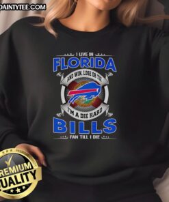 Alt Text: Florida fan wearing 'Dead Hard Buffalo Bills Fan' sweatshirt, showcasing loyalty to the team, win or lose.