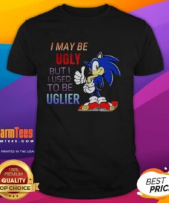 Alt Text: Cartoon hedgehog T-shirt with the phrase I May Be Ugly But I Used To Be Uglier, showcasing humor and style.