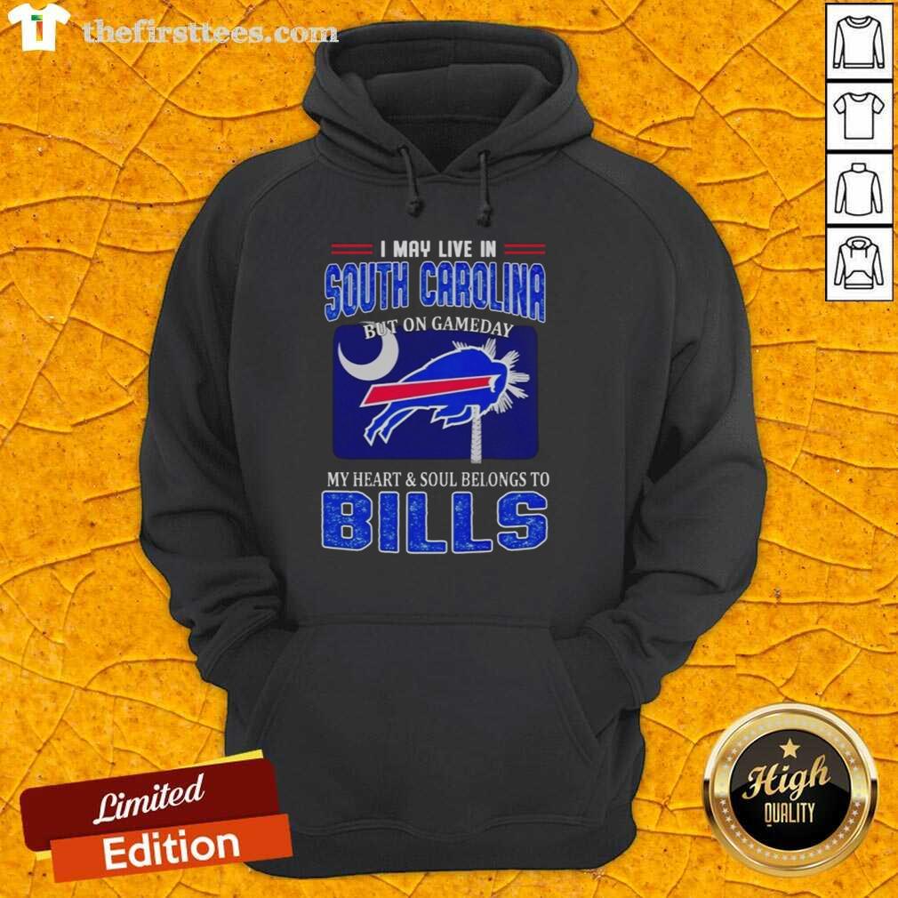 nice-i-may-live-in-south-carolina-but-on-gameday-my-heart-and-soul-belongs-to-bills-hoodie South Carolina fan in a Bills hoodie, showcasing team spirit on game day with heart and soul for the Buffalo Bills.