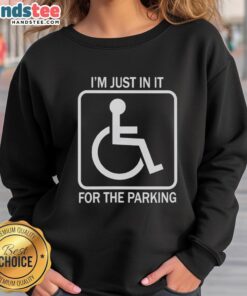 Cozy 'Nice, I'm Just In It For The Parking' sweatshirt displayed on a hanger against a stylish backdrop.