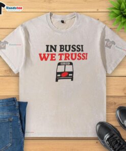 Alt Text: Nice in Bussi We Trussi Carolina Hurricanes washed t-shirt featuring team logo and stylish design for fans.